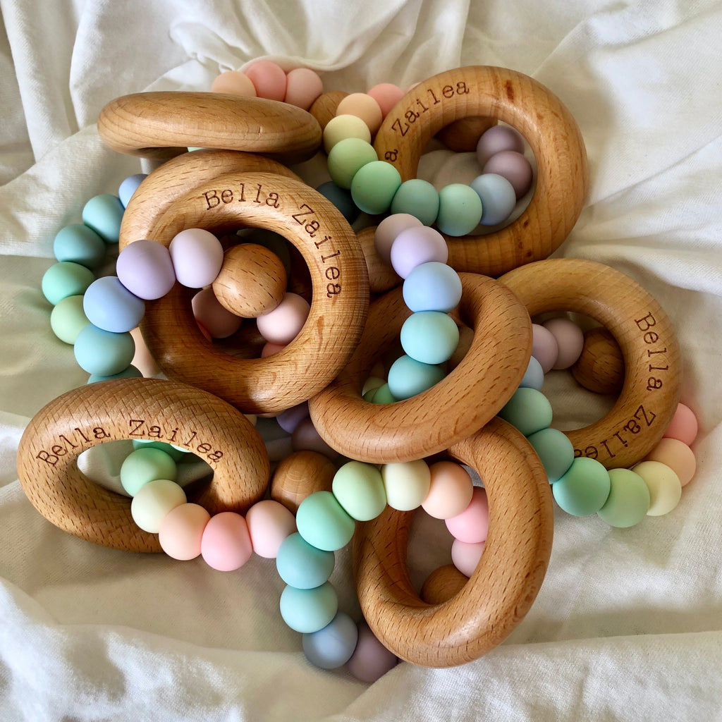 pastel rainbow beech wood wooden ring and silicone bead teething toy