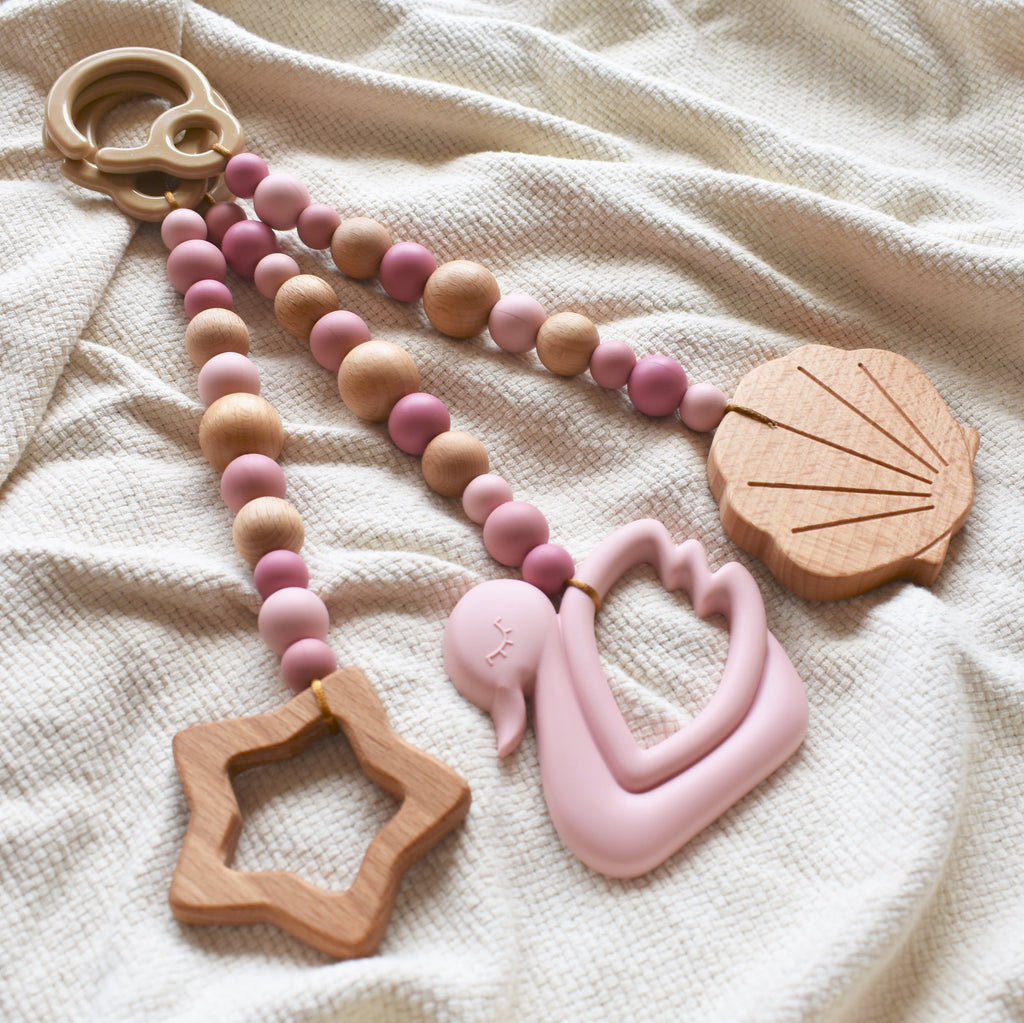 Clip on toys for baby gym top